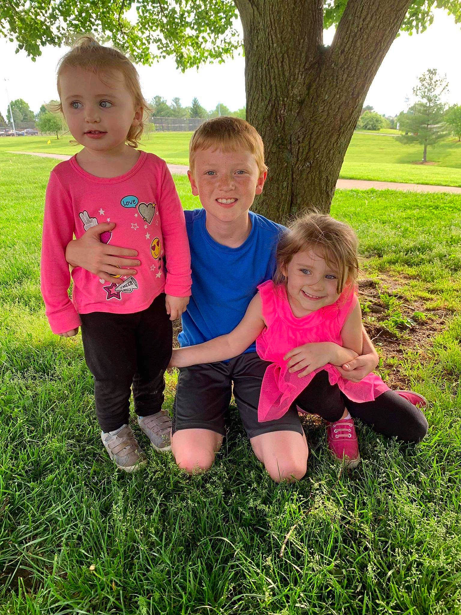 Nevaeh is registered to the contest to win money with this photo: child, family, fun, grass, grass_family, green, happy, joy, lawn, people, person, pink, plant, play, sibling, sitting, smile, spring, summer, toddler