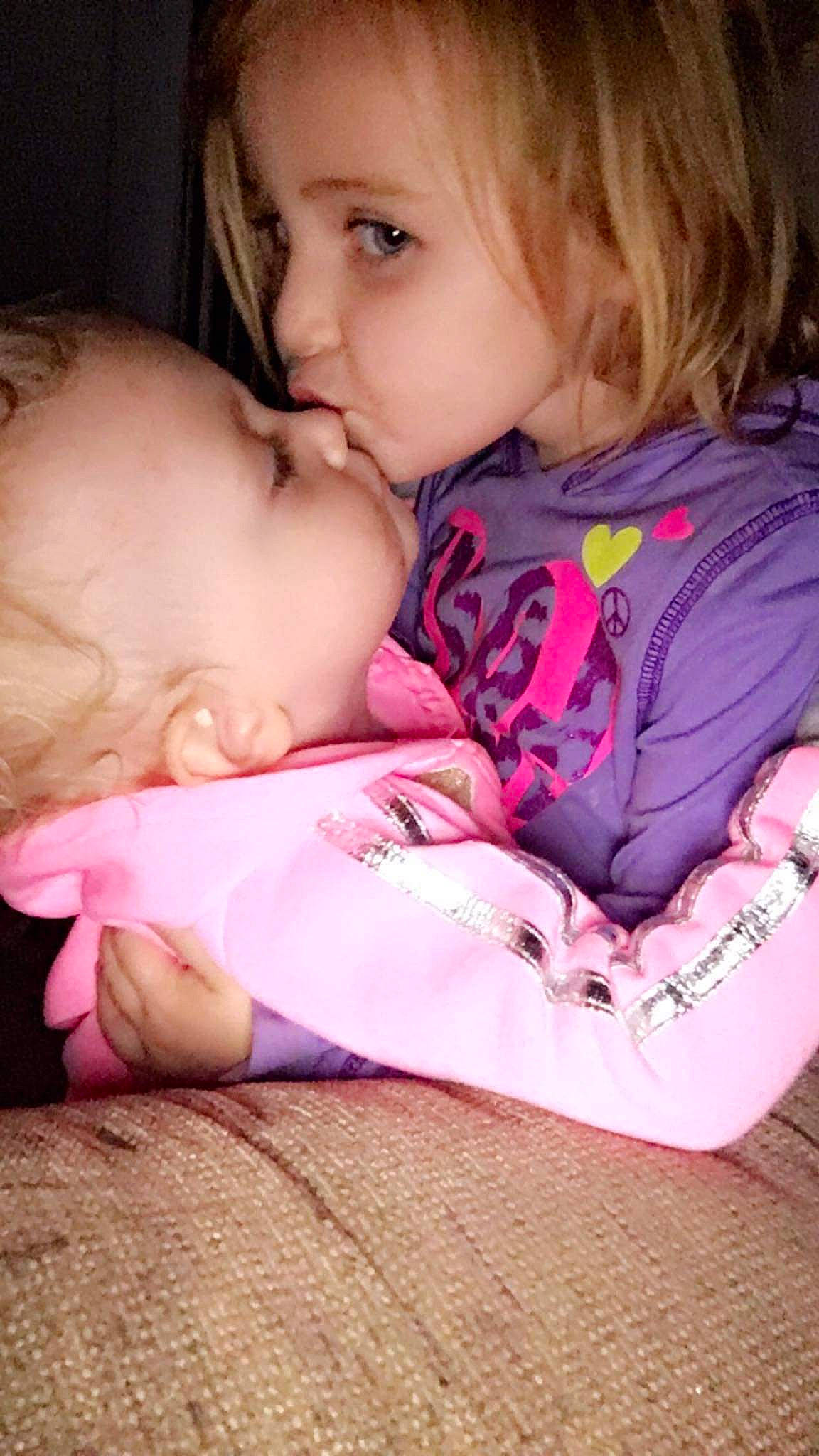 Nevaeh is registered to the contest to win money with this photo: baby, bedtime, cheek, child, eye, finger, gesture, interaction, lip, love, nap, nose, person, pink, sibling, skin, toddler