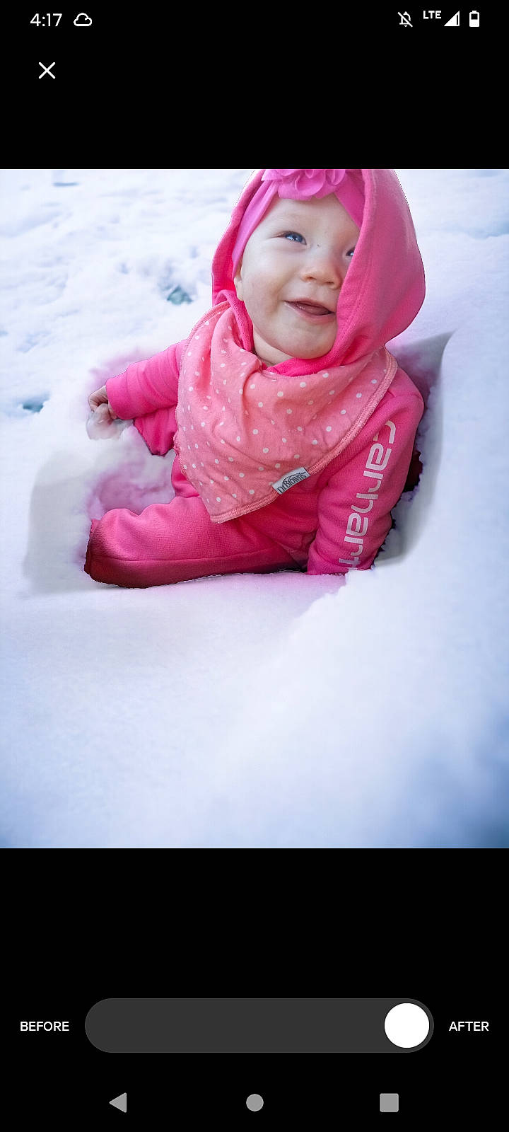 Tiana is registered to the contest to win money with this photo: baby, baby_toddler_clothing, cheek, child, clothing, eye, face, freezing, fun, happy, head, headgear, headwear, hood, jacket, magenta, person, pink, sleeve, smile