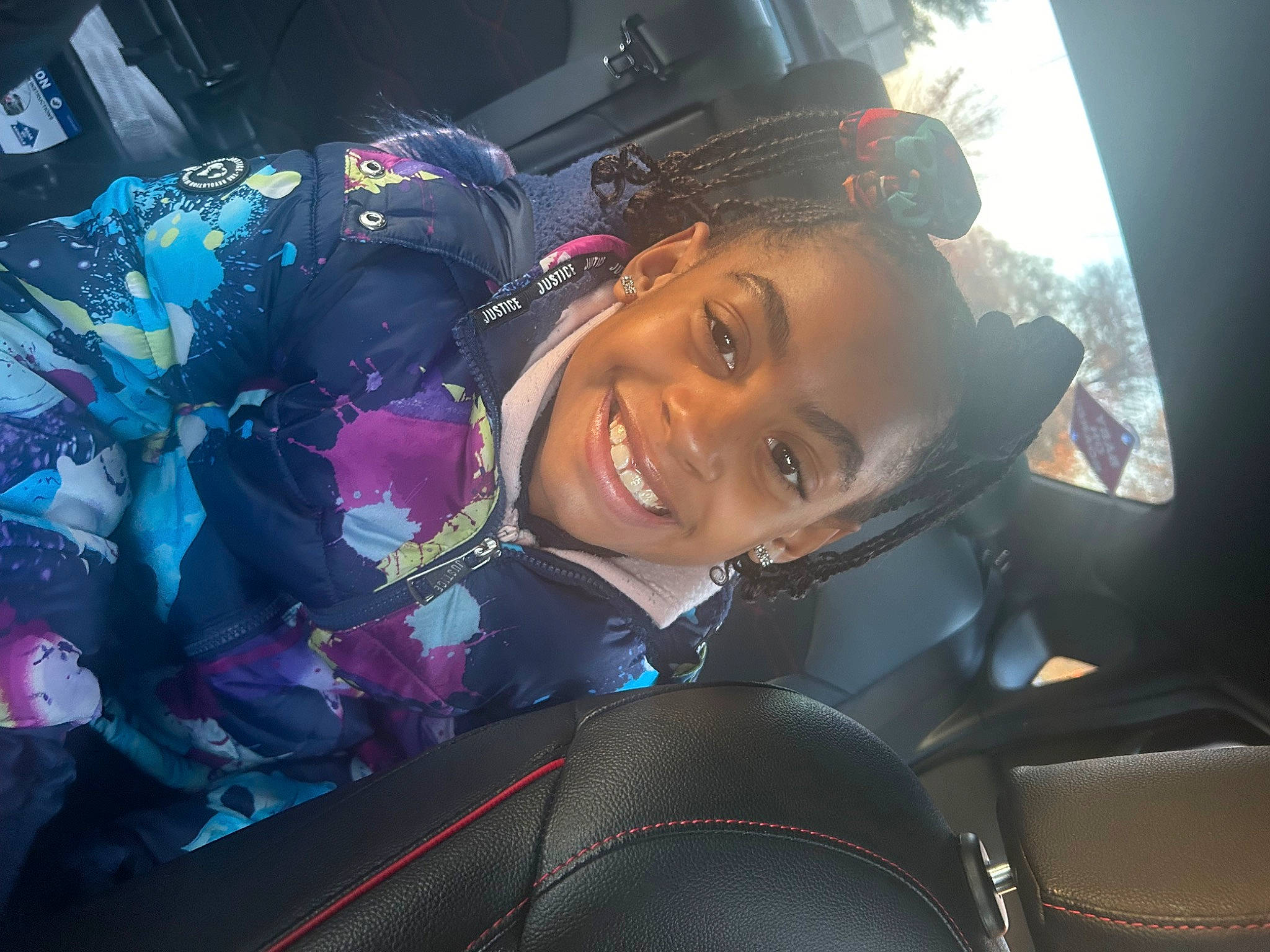 Maya joined the competition — help win amazing prizes! auto_part, automotive_design, automotive_exterior, automotive_lighting, car_seat, car_seat_cover, electric_blue, family_car, flash_photography, fun, happy, hat, head_restraint, joy, motor_vehicle, person, personal_luxury_car, smile, steering_wheel, vehicle