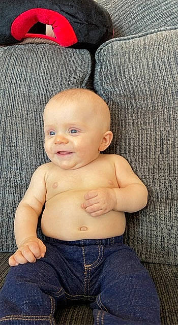 Westley is registered to the contest to win money with this photo: baby, baby_toddler_clothing, cheek, chin, eye, eyebrow, face, finger, flash_photography, hair, head, human_body, iris, lip, mouth, nose, person, skin, smile, stomach