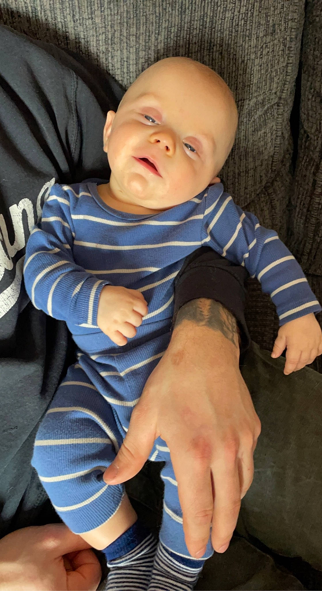 Westley is registered to the contest to win money with this photo: baby, baby_toddler_clothing, cheek, collar, comfort, elbow, eye, facial_expression, finger, gesture, hand, joint, leg, neck, nose, person, skin, sleeve, standing, toddler