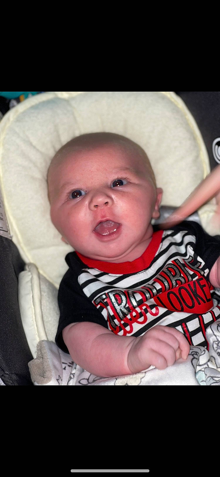 Travis joined the competition — help win amazing prizes! baby, baby_products, baby_safety, baby_toddler_clothing, cheek, child, chin, comfort, eyebrow, happy, iris, lip, mouth, nose, person, sitting, skin, sleeve, t_shirt, toddler