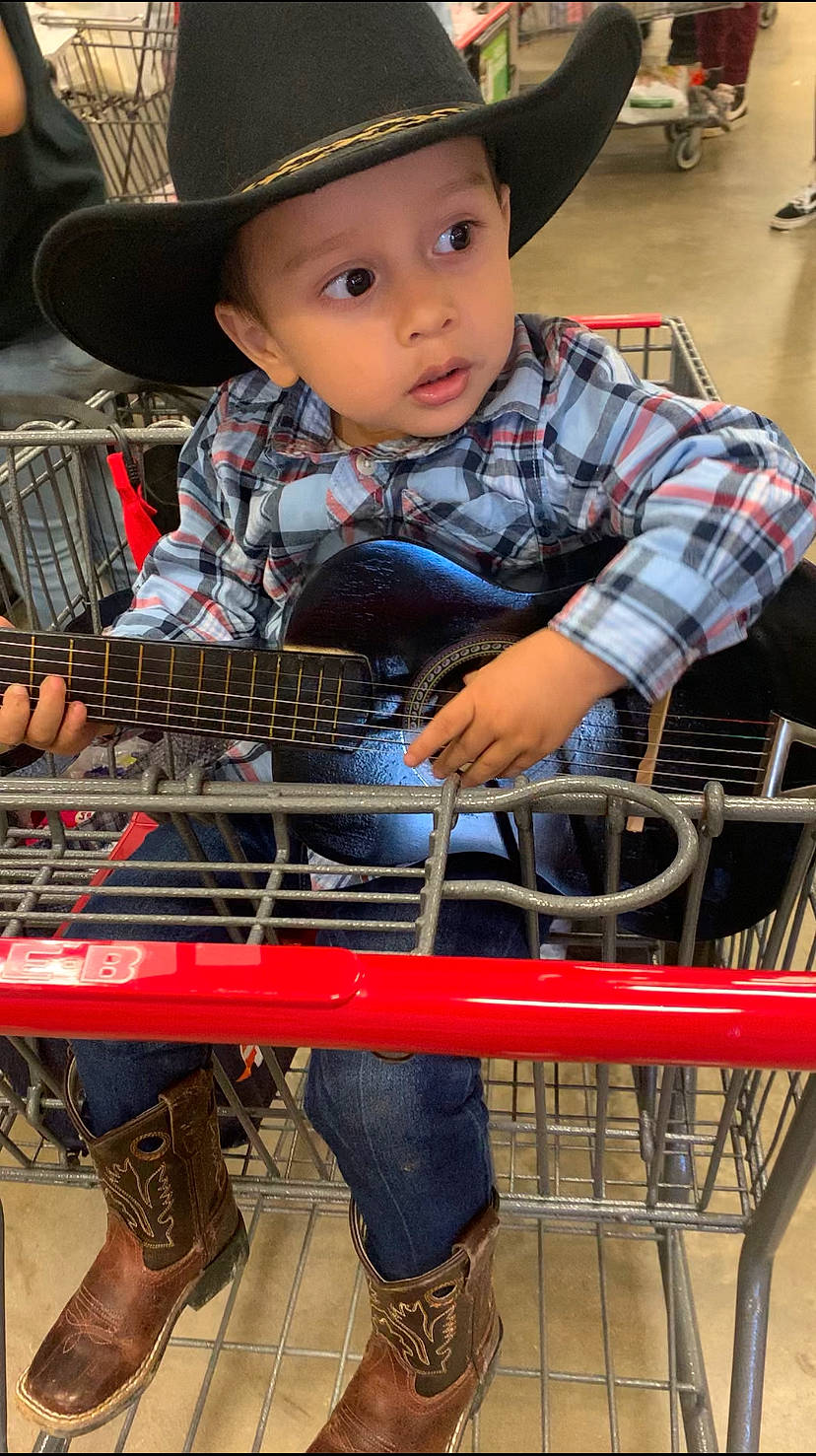 Elian joined the competition — help win amazing prizes! child, clothing, fedora, hat, headgear, headwear, helmet, musical_instrument, people, person, photograph, plaid, product, shoe, shopping_cart, snapshot, street_fashion, sun_hat, surprise, tartan