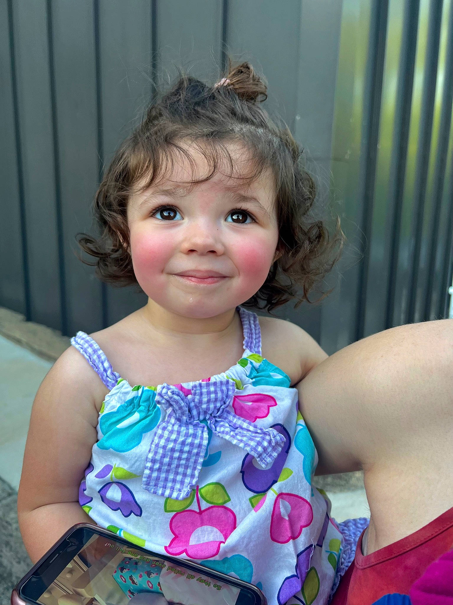 Jocelyn is registered to the contest to win money with this photo: baby_toddler_clothing, beauty, blond, child, electric_blue, face, facial_expression, fashion, fun, happy, iris, joy, leisure, pattern, people, person, pink, sitting, skin, smile