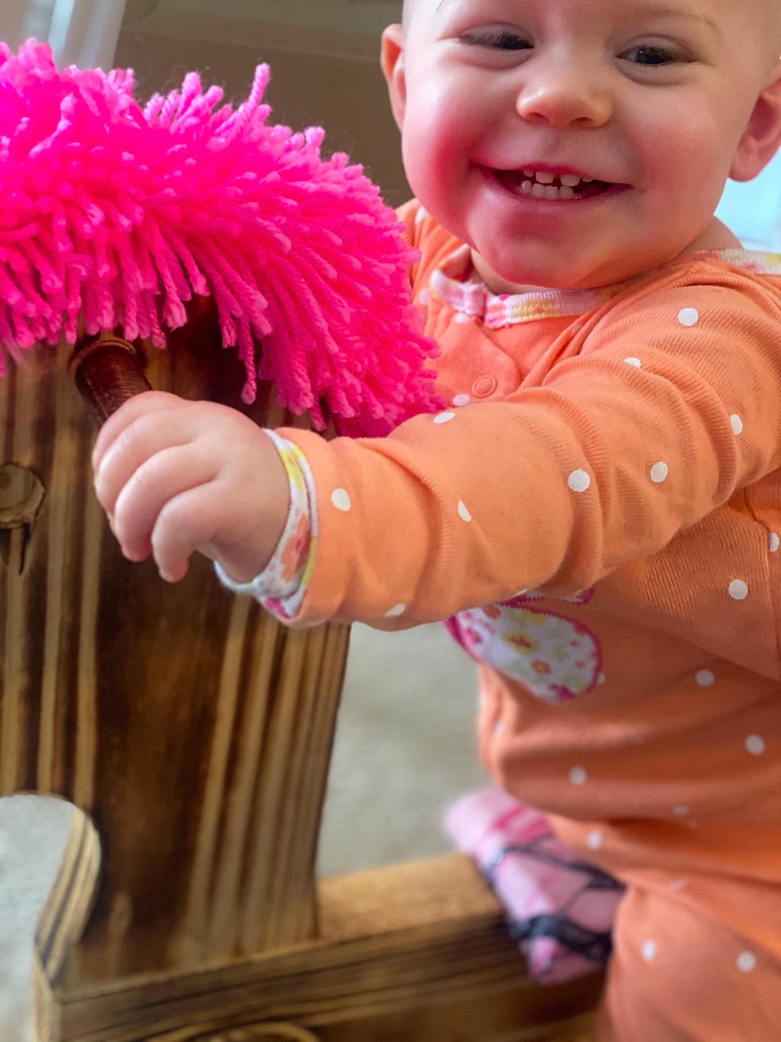 Briar joined the competition — help win amazing prizes! baby, baby_laughing, baby_toddler_clothing, finger, flower, fun, gesture, hand, happy, headwear, joy, magenta, people, person, photograph, pink, plant, purple, skin, sleeve