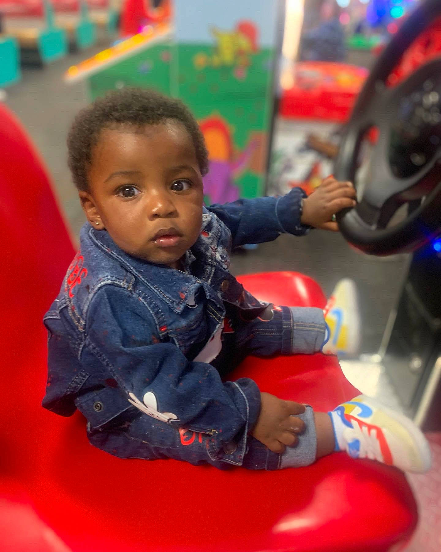 Jakobe joined the competition — help win amazing prizes! auto_part, automotive_design, automotive_exterior, baby, child, fun, hairstyle, happy, leisure, motor_vehicle, person, play, recreation, red, sitting, skin, snapshot, steering_wheel, toddler, transport