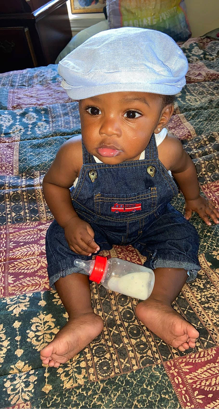 Jakobe is registered to the contest to win money with this photo: baby, baby_toddler_clothing, beauty, blue, cap, child, electric_blue, fun, happy, hat, headwear, human_leg, pattern, people_in_nature, person, shorts, skin, soil, t_shirt, thigh