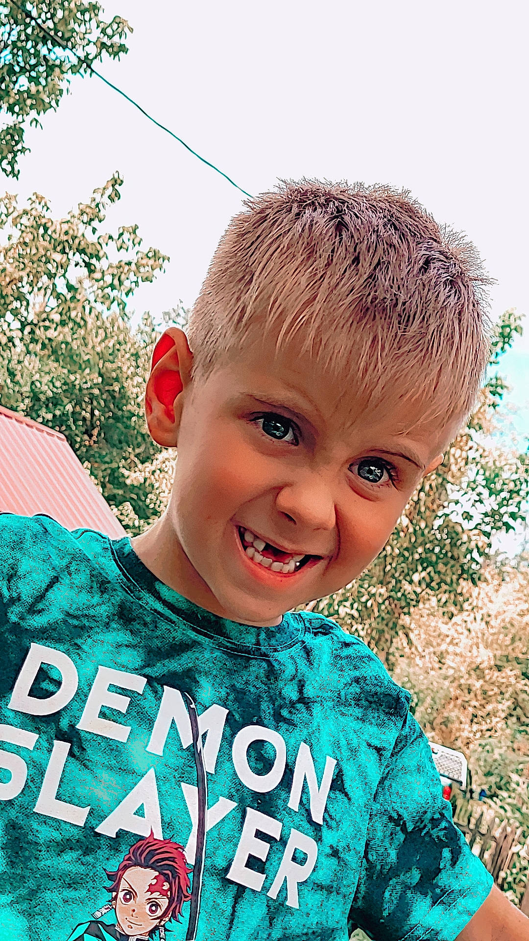 Jullian joined the competition — help win amazing prizes! child, cool, facial_expression, fun, grass, happy, joy, laugh, leisure, people_in_nature, person, photo_caption, plant, portrait_photography, recreation, sky, sleeve, smile, t_shirt, toddler