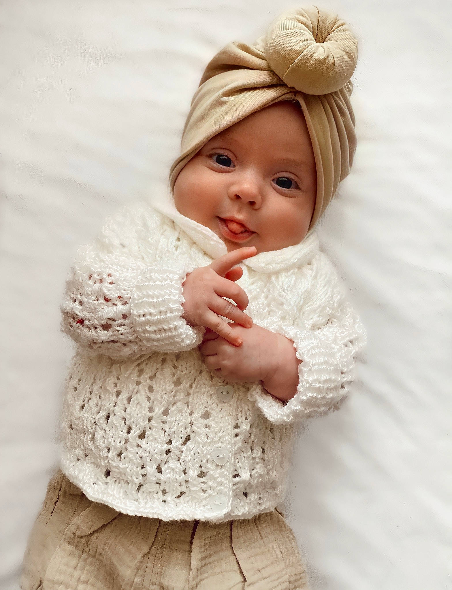 Bianca joined the competition — help win amazing prizes! arm, baby, baby_toddler_clothing, cap, cheek, comfort, dress, embellishment, face, gesture, hand, happy, headgear, knit_cap, lip, person, pink, skin, sleeve, toddler