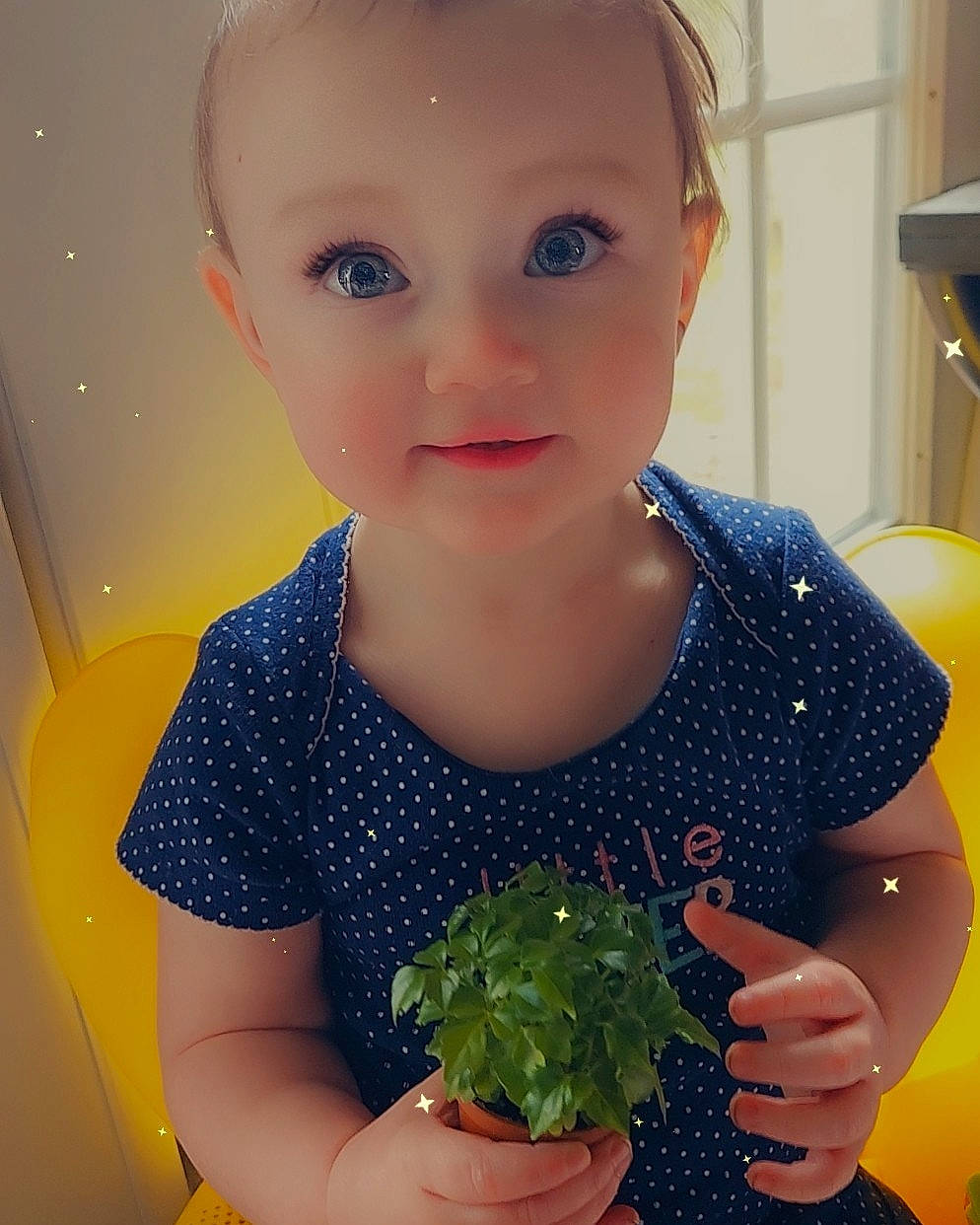 Juniper is registered to the contest to win money with this photo: baby_toddler_clothing, broccoli, child, cruciferous_vegetables, finger, food, grass, happy, herb, ingredient, leaf_vegetable, local_food, natural_foods, person, plant, produce, recipe, smile, superfood, toddler