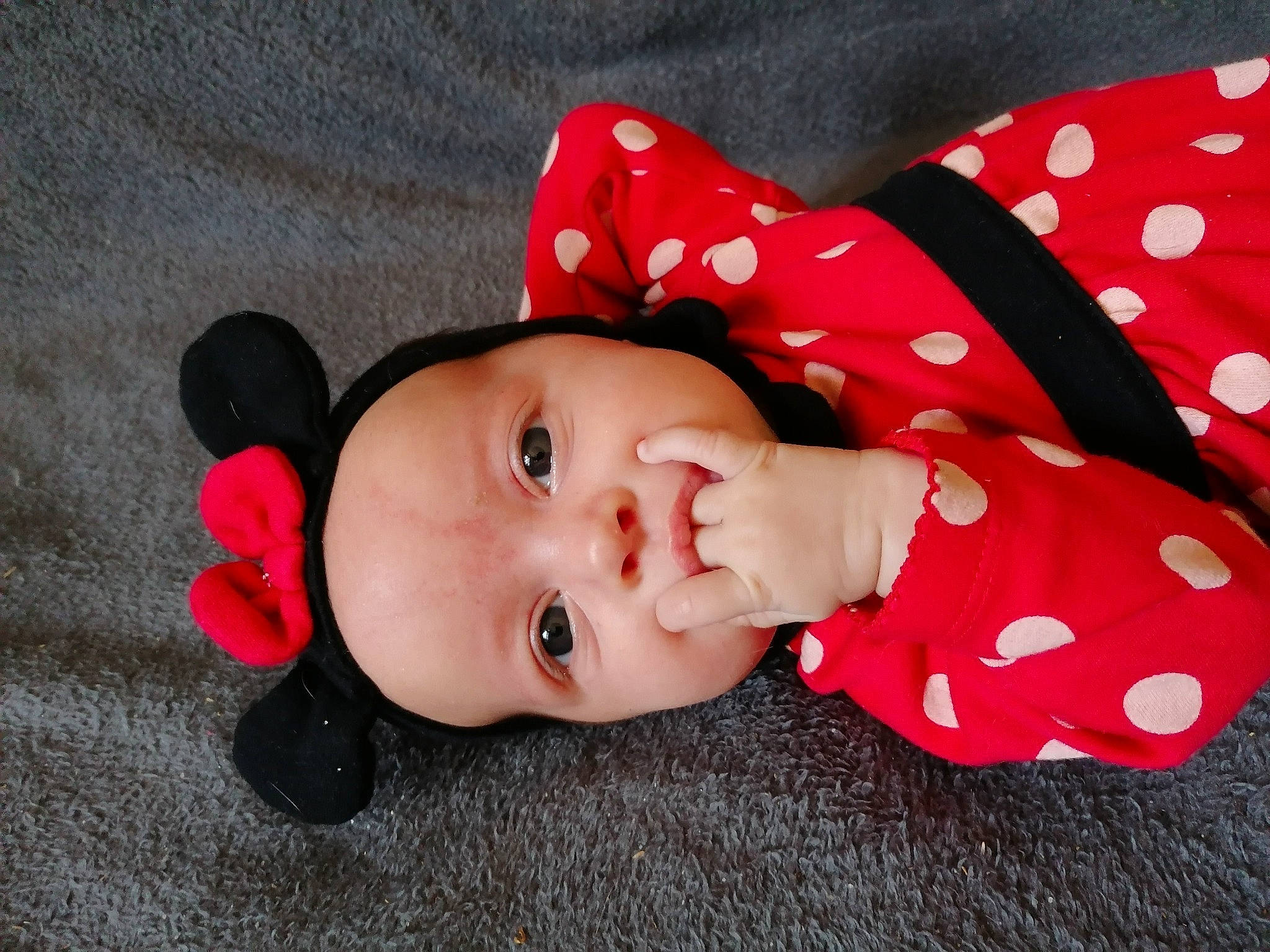 Louna participe au concours pour gagner de l'argent avec cette photo : baby, baby_products, baby_toddler_clothing, cheek, child, collar, face, fashion_accessory, hat, headgear, headwear, lip, magenta, nose, pattern, person, pink, product, skin, sleeve