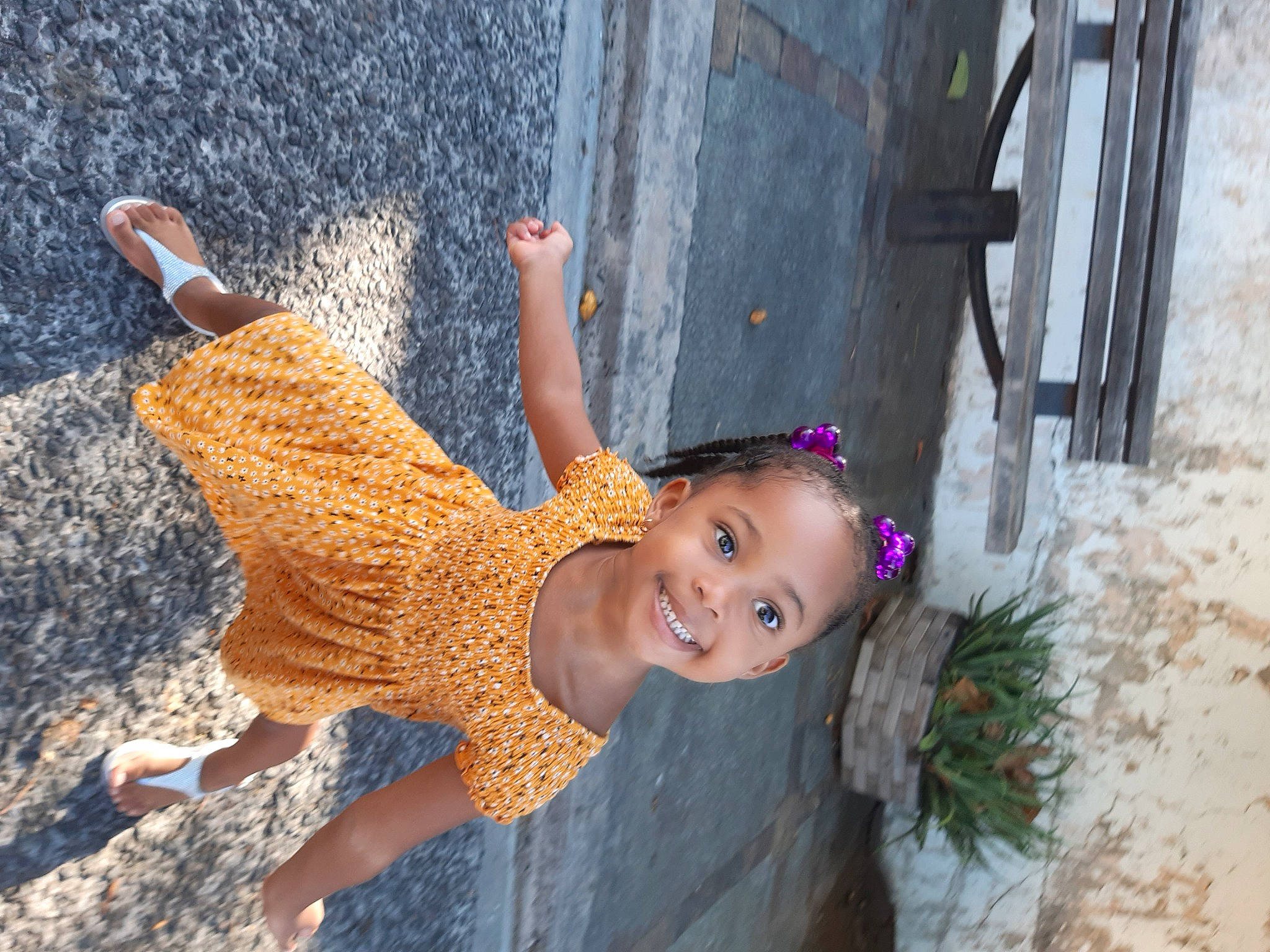 Djahmélya participe au concours pour gagner de l'argent avec cette photo : child, fashion_accessory, fun, grass, happy, hat, joy, landscape, leisure, magenta, people, person, play, recreation, smile, toddler, tourism, vacation, water