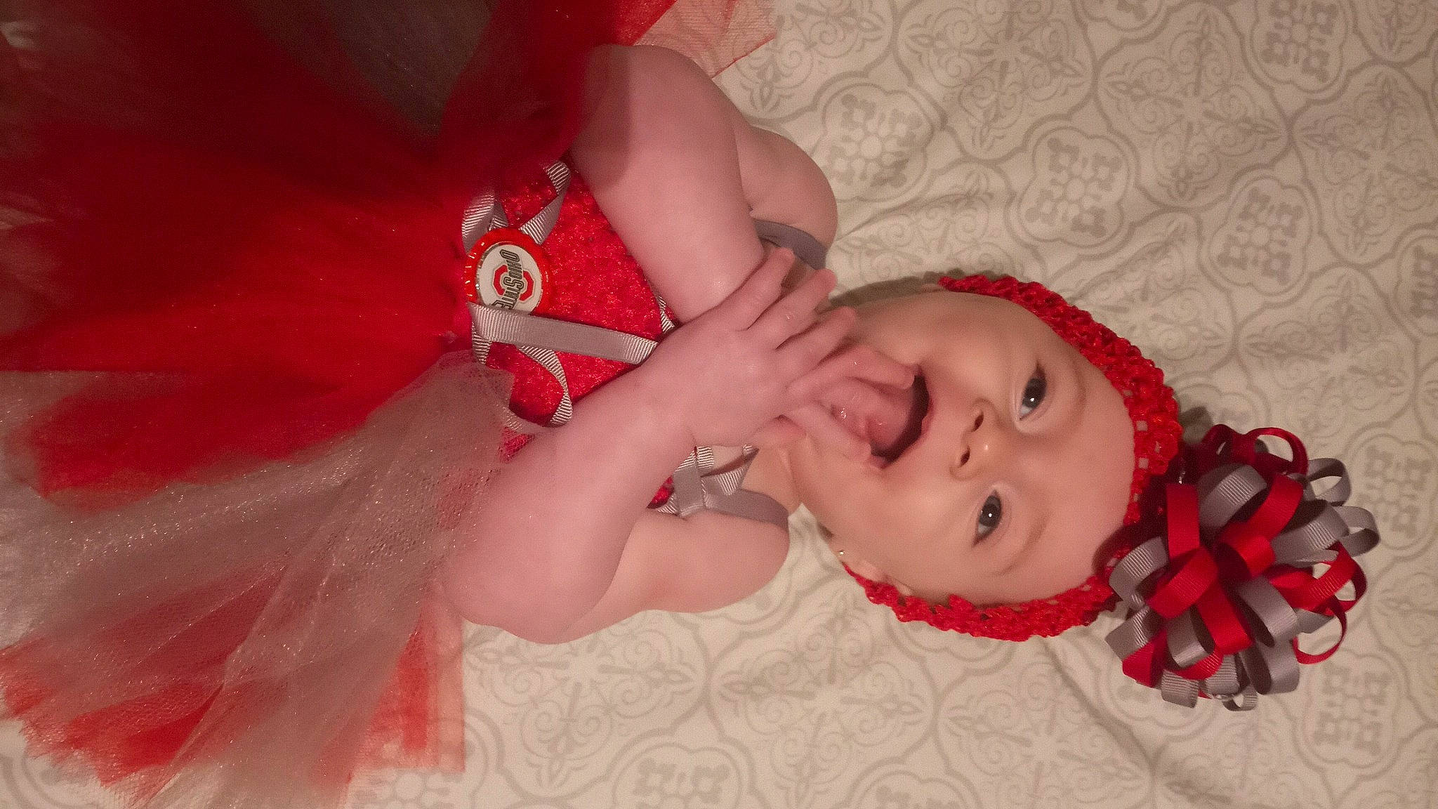 Jasmin joined the competition — help win amazing prizes! arm, baby, baby_toddler_clothing, dress, eye, eyebrow, eyelash, gesture, happy, head, headgear, headwear, human_body, iris, lip, mouth, neck, nose, person, pink