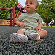 Amir joined the competition — help win amazing prizes! toddler, child, playground, swing, outdoor, grass, tree, person, parent, bench, summer, daylight, casual_clothing, footwear, sitting, curious, park, play, nature, family
