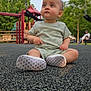 toddler, child, playground, swing, outdoor, grass, tree, person, parent, bench, summer, daylight, casual_clothing, footwear, sitting, curious, park, play, nature, family
