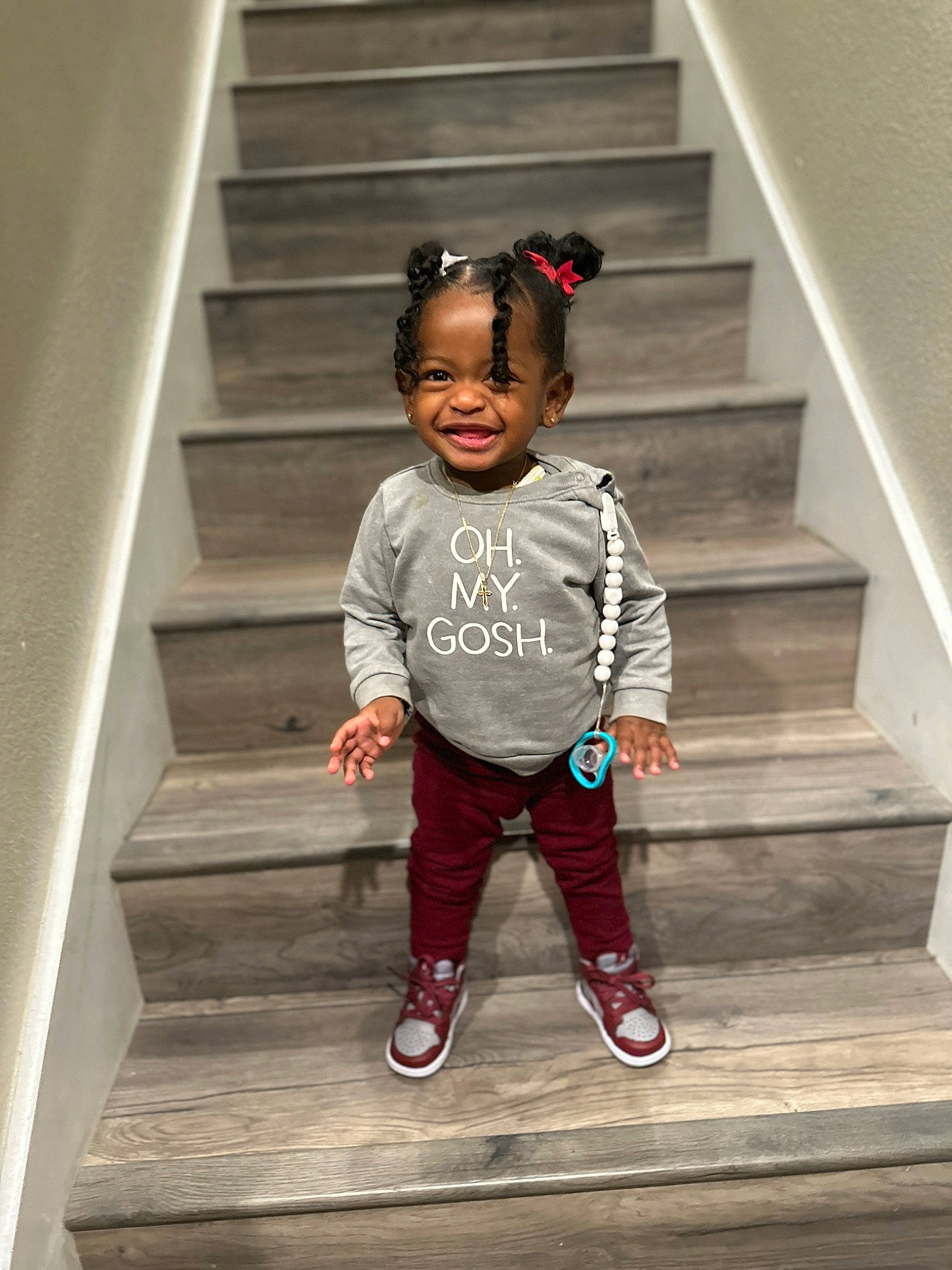 Lariah is registered to the contest to win money with this photo: baby_toddler_clothing, child, electric_blue, flash_photography, fun, grey, happy, head, magenta, person, shoe, sleeve, smile, sneakers, stairs, t_shirt, tints_and_shades, toddler, tree, white