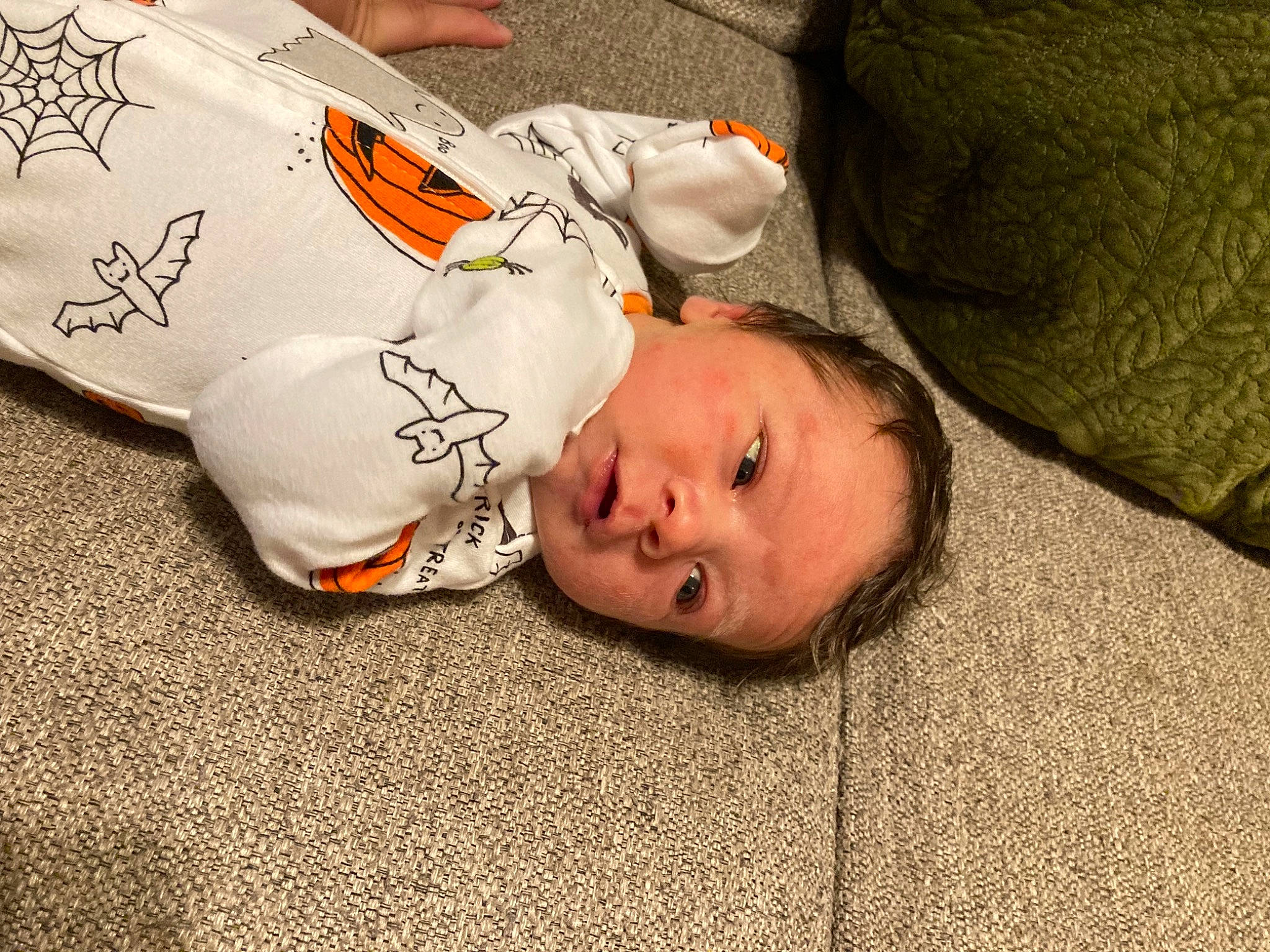 Jonah is registered to the contest to win money with this photo: baby, baby_toddler_clothing, child, comfort, couch, flooring, fur, grass, linens, nap, person, room, sitting, sleep, toddler, wood