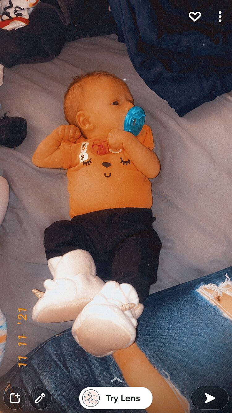 Ariel is registered to the contest to win money with this photo: abdomen, baby, child, comfort, doll, finger, fun, joint, knee, lap, mouth, orange, person, plush, skin, stomach, stuffed_toy, teddy_bear, thigh, toy