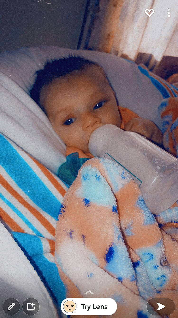 Ariel is registered to the contest to win money with this photo: baby, baby_products, baby_safety, baby_sleeping, baby_toddler_clothing, bedtime, cheek, chin, comfort, eyebrow, infant_bed, iris, linens, lip, mouth, nose, person, skin, textile, thumb