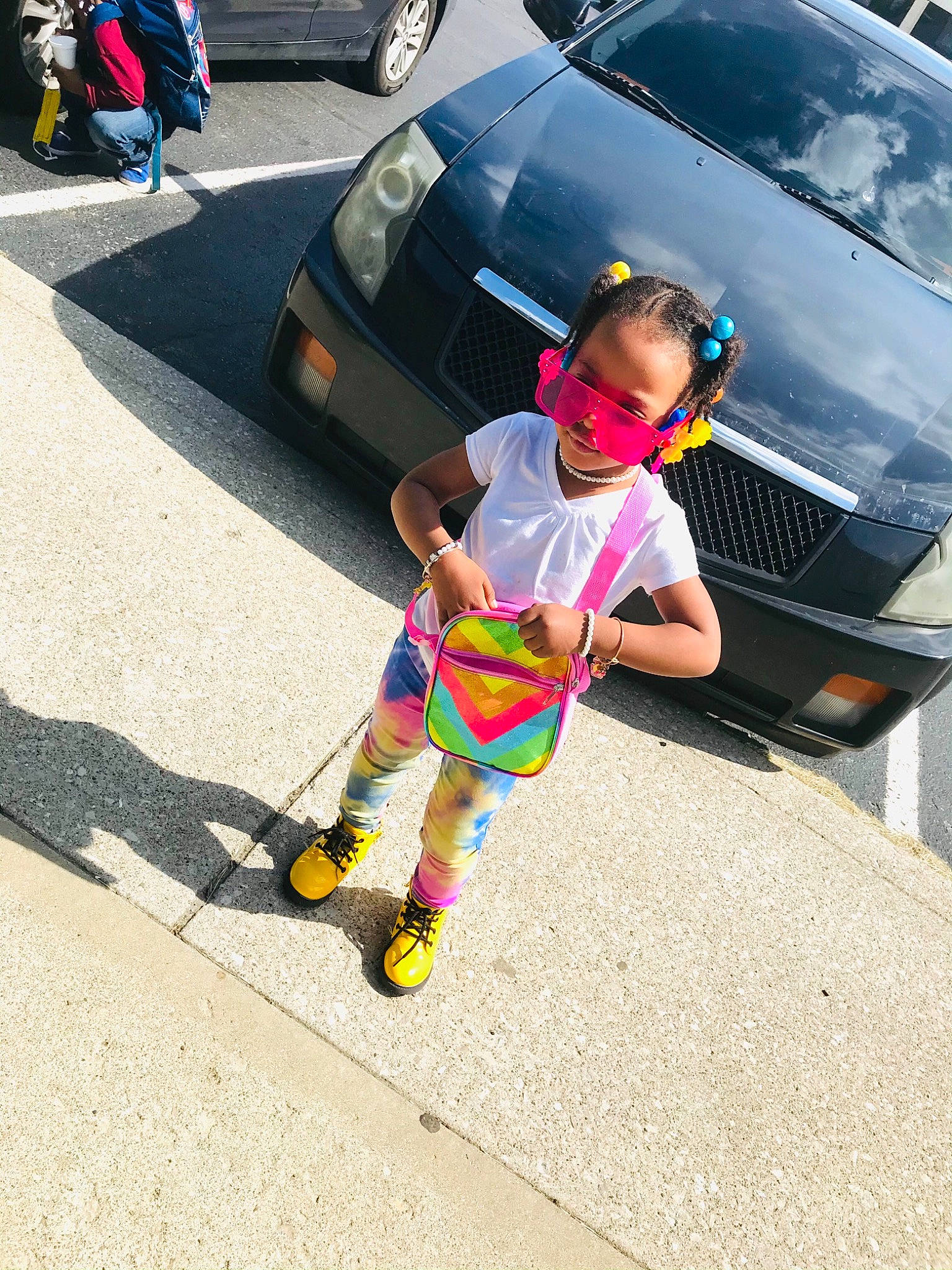 Alice joined the competition — help win amazing prizes! asphalt, automotive_design, automotive_exterior, automotive_lighting, automotive_tire, car, eyewear, hood, jeans, land_vehicle, motor_vehicle, person, shorts, street_fashion, sunglasses, tire, toy, trunk, vehicle, vehicle_door