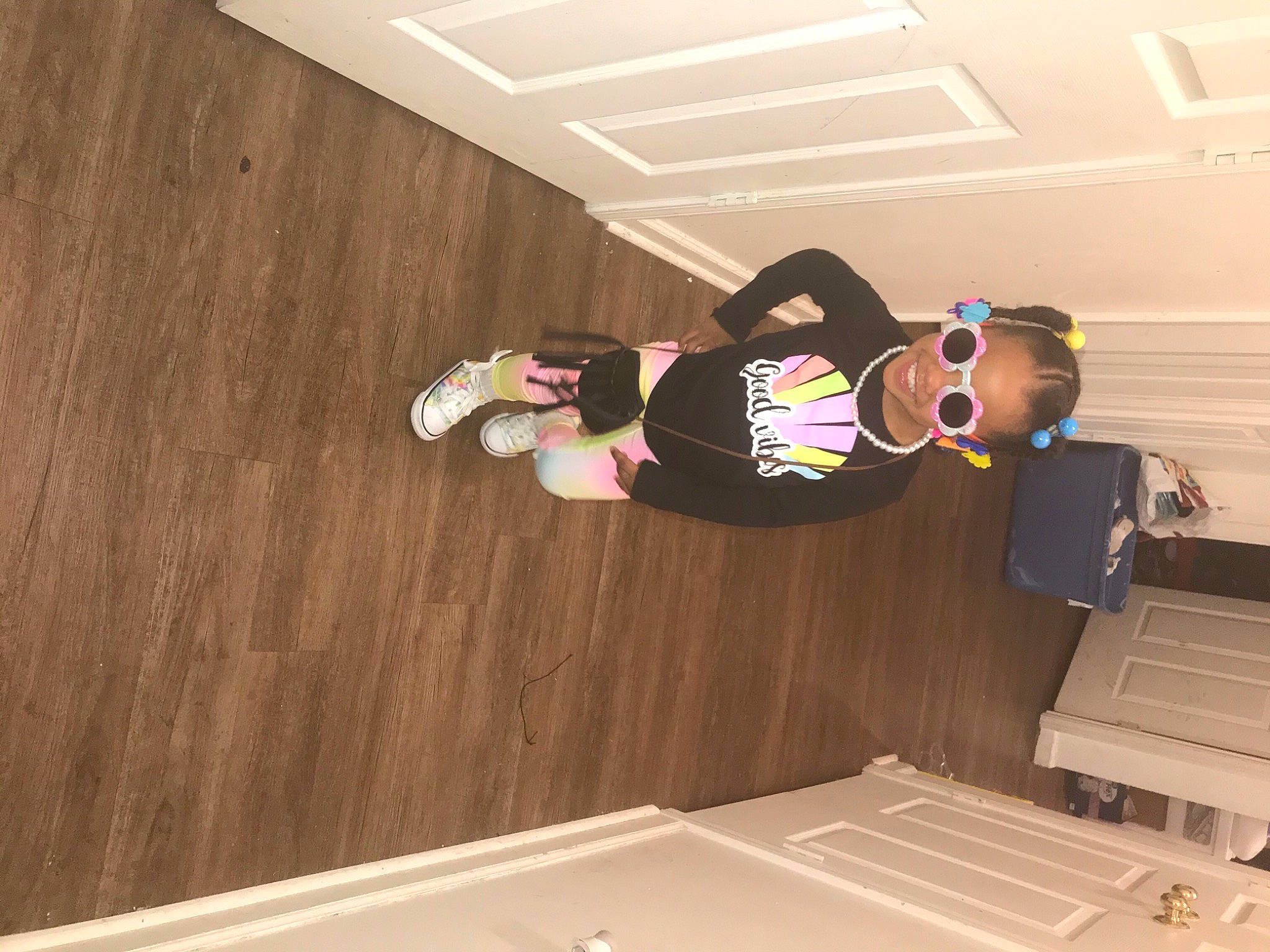 Alice joined the competition — help win amazing prizes! adventure, ceiling, floor, flooring, fun, hardwood, hat, house, individual_sports, joy, person, plywood, recreation, room, sportswear, stairs, t_shirt, table, wall, wood