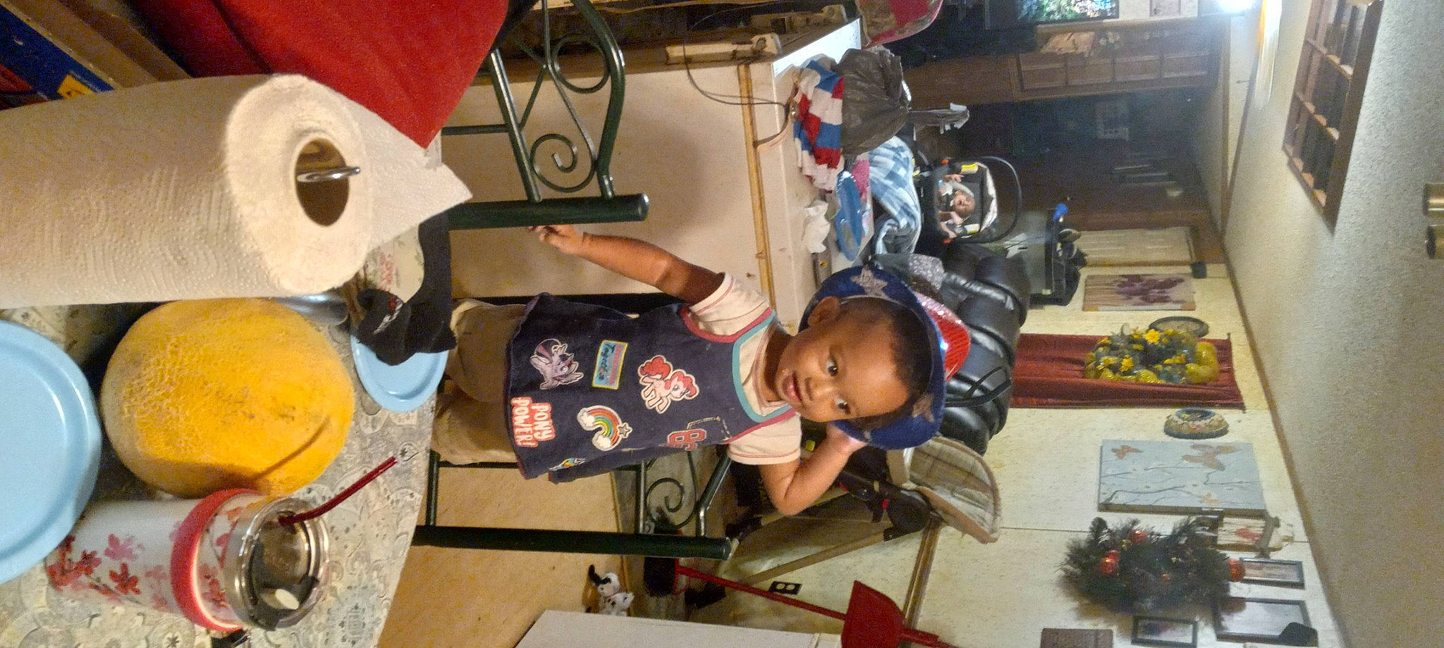 Heather is registered to the contest to win money with this photo: baby, baby_products, baby_toys, bag, carmine, child, collection, fun, helmet, luggage_and_bags, machine, people, person, personal_protective_equipment, play, room, toddler, toy, toy_vehicle