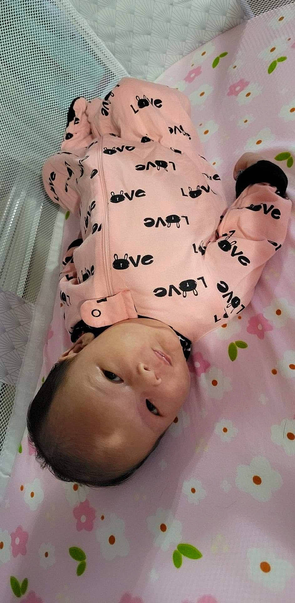 Gwen joined the competition — help win amazing prizes! baby, baby_products, baby_toddler_clothing, cheek, child, chin, comfort_food, eyebrow, font, gesture, happy, head, mouth, pattern, person, pink, plant, skin, smile, sweetness