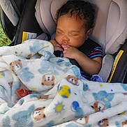 Steven joined the competition — help win amazing prizes! baby, sleeping, car_seat, blanket, teddy_bear_pattern, child, infant, cute, cozy, soft, resting, peaceful, curly_hair, comfort, indoors, seatbelt, striped_shirt, toddler, portrait, nursery