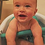 baby, child, bath, tub, water, smiling, happy, indoor, skin, face, arms, legs, droplets, closeup, cute, infant, joyful, expression, sitting, playful
