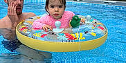Zoé participe au concours pour gagner de l'argent avec cette photo : blue, child, expression, family, fence, float, fun, garden, house, man, outdoor, playful, pool, recreation, summer, sunlight, swimming, swimwear, toy, water
