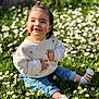 baby, blue_jeans, casual_clothing, child, cute, daisies, flowers, grass, greenery, happy, nature, outdoor, playful, sitting, smiling, socks, spring, sunlight, toddler, white_sweater