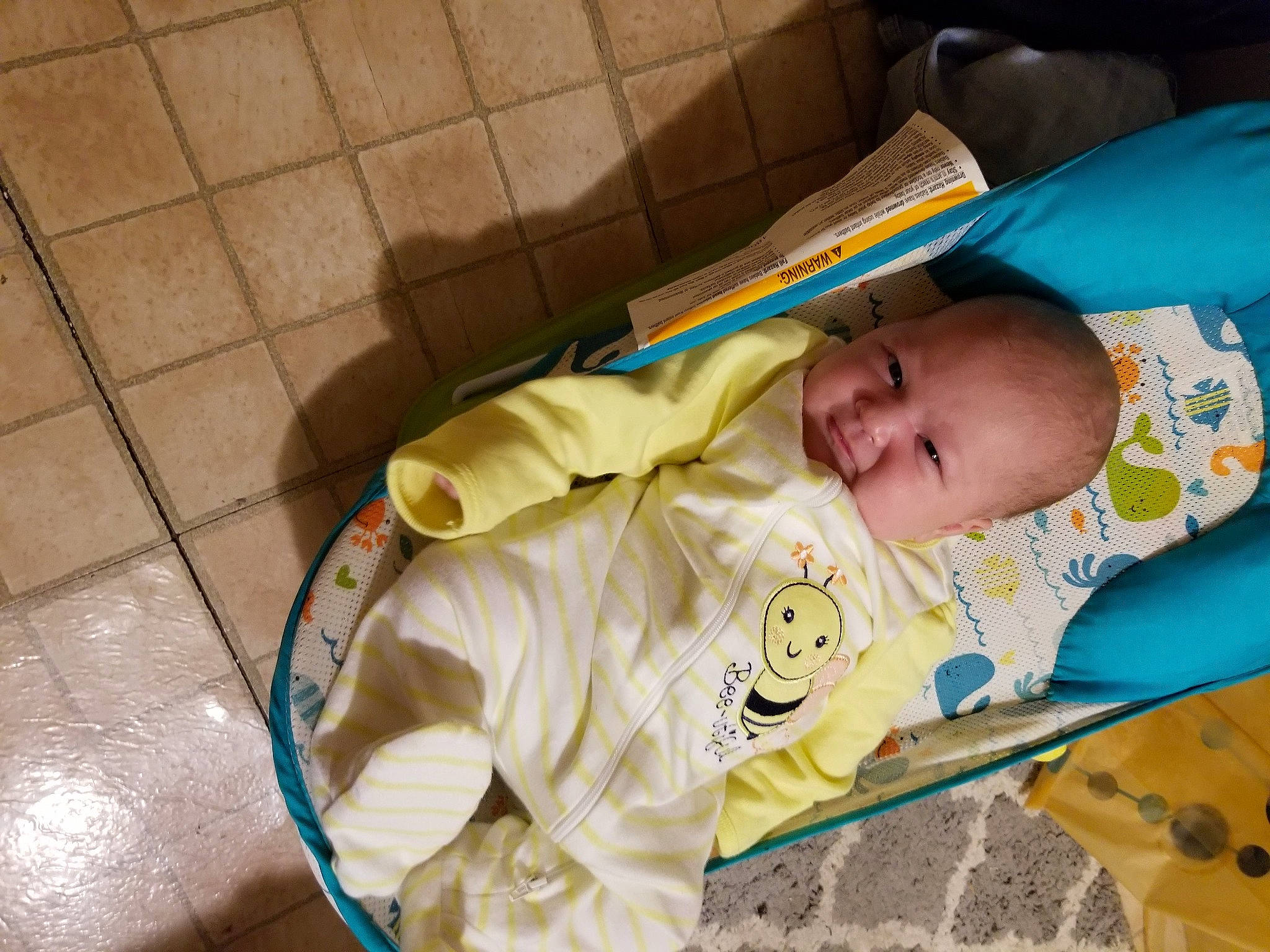 Anabelle is registered to the contest to win money with this photo: baby, baby_products, baby_safety, baby_toddler_clothing, bedtime, child, comfort, eye, flooring, grass, happy, linens, person, sitting, skin, sleep, sleeve, smile, toddler, vertebrate