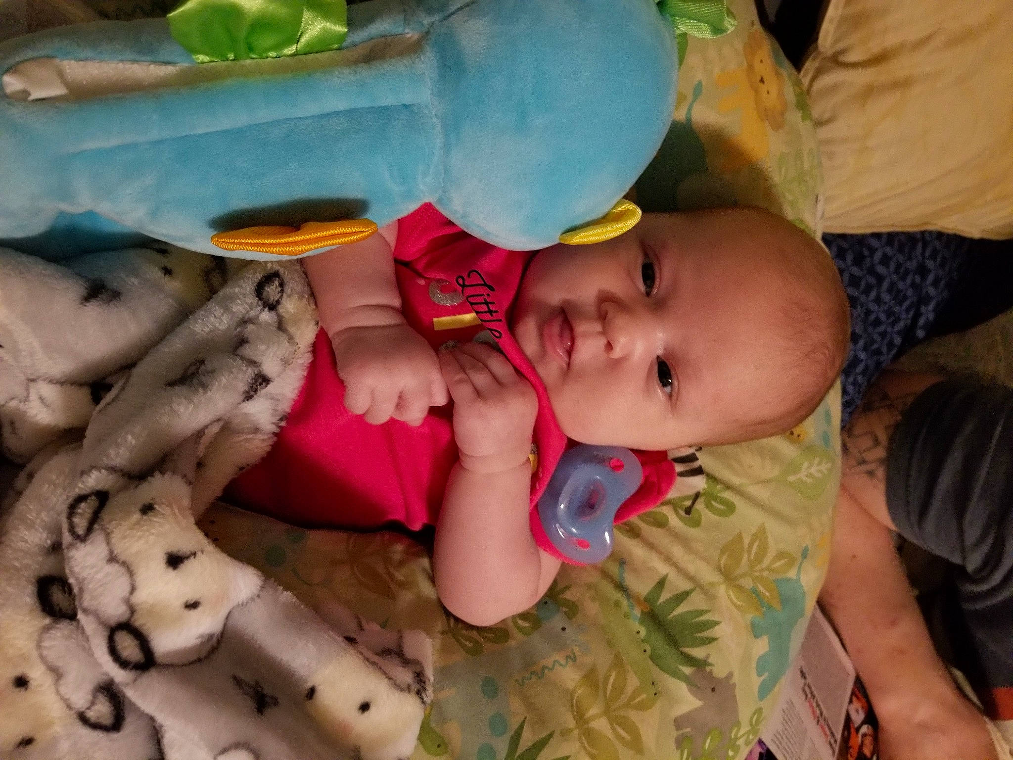 Anabelle joined the competition — help win amazing prizes! adaptation, baby, baby_products, baby_toddler_clothing, child, finger, fun, green, happy, human, mouth, nail, organ, person, room, sitting, skin, smile, toddler, toy