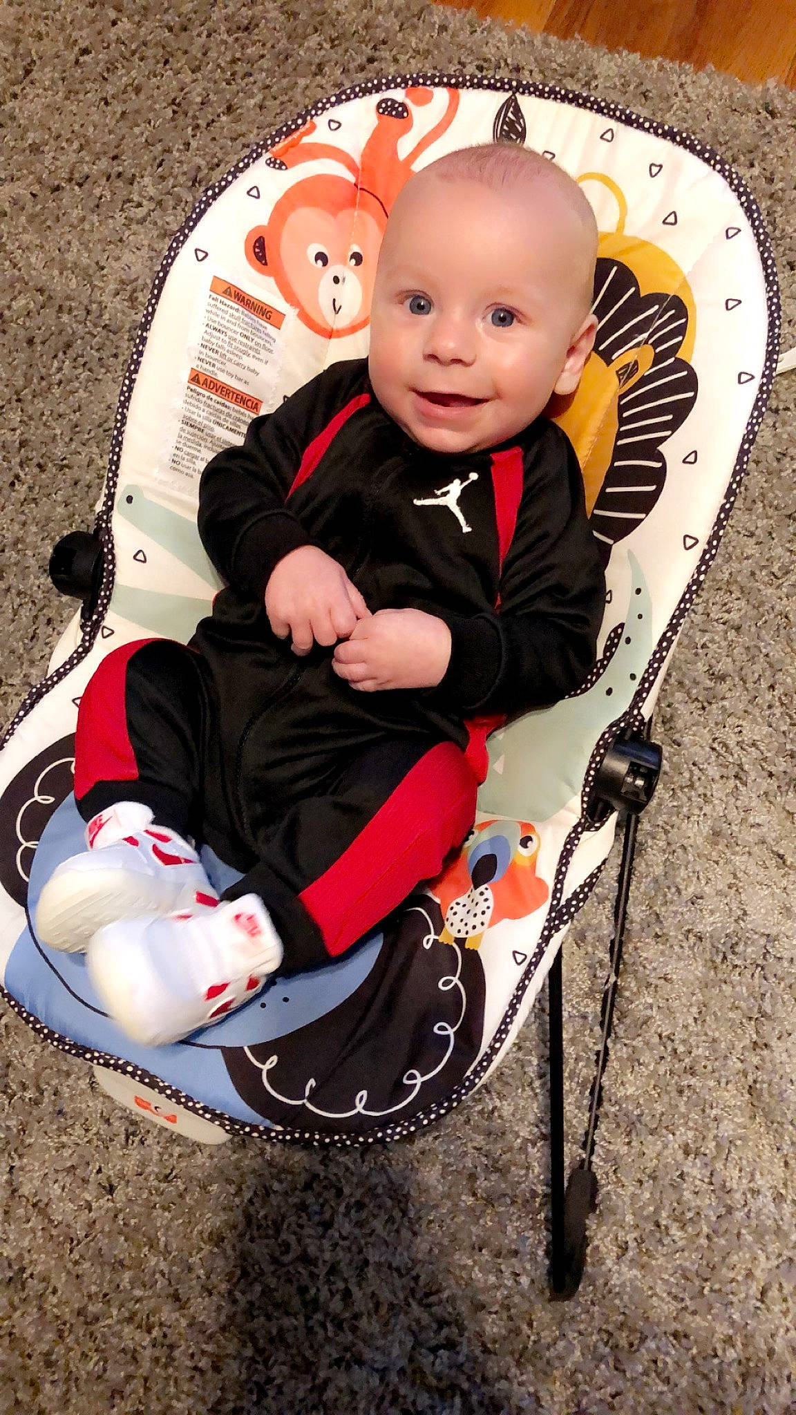 Justin Jr joined the competition — help win amazing prizes! baby, baby_carriage, baby_products, baby_toddler_clothing, chair, cheek, child, comfort, eye, face, happy, head, joy, lap, mammal, person, photograph, shoe, sleeve, smile
