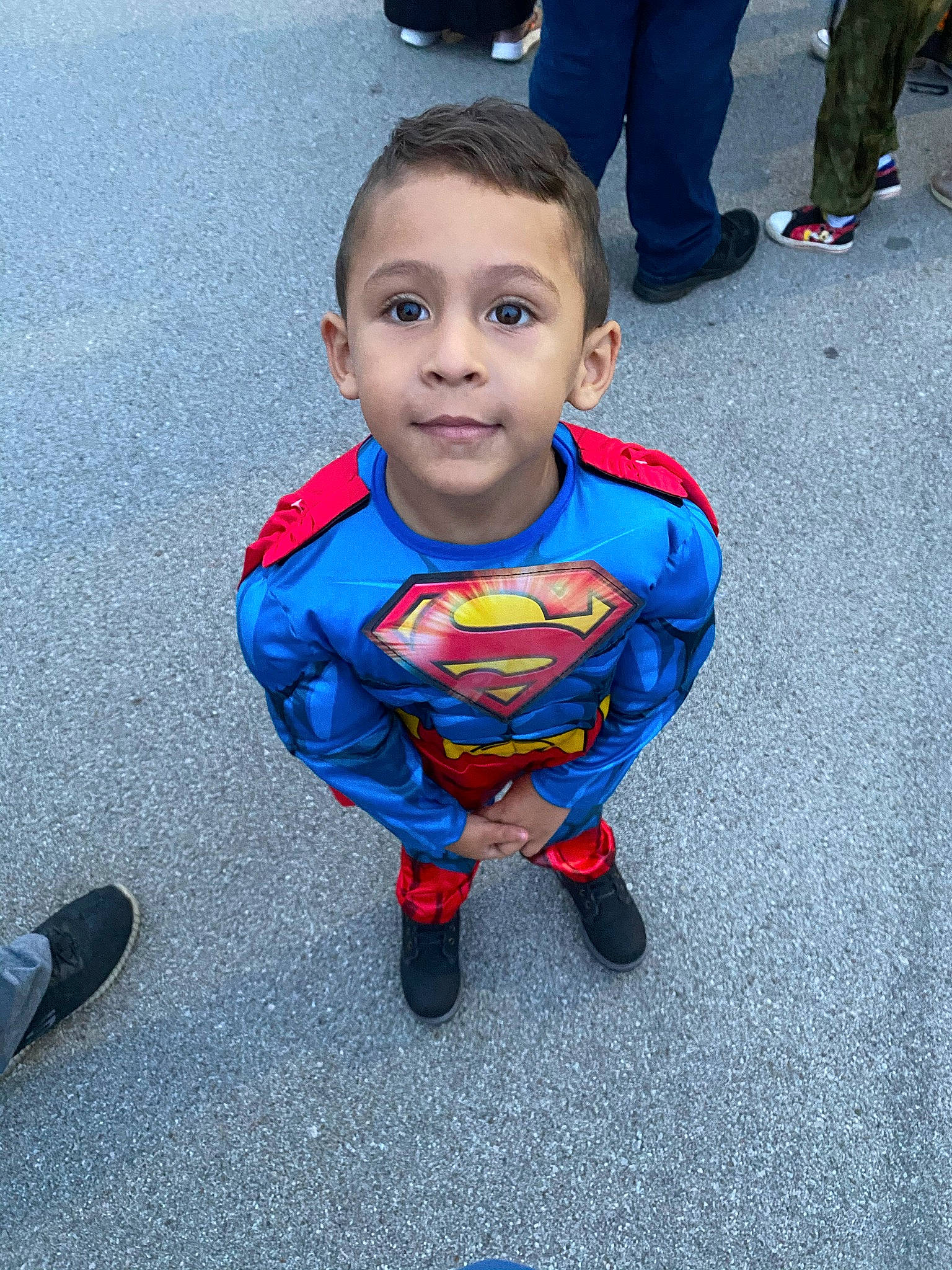 Ashton joined the competition — help win amazing prizes! asphalt, azure, baby, baby_toddler_clothing, blue, child, cool, electric_blue, eye, flooring, fun, happy, justice_league, people, person, road_surface, shoe, sneakers, standing, superman