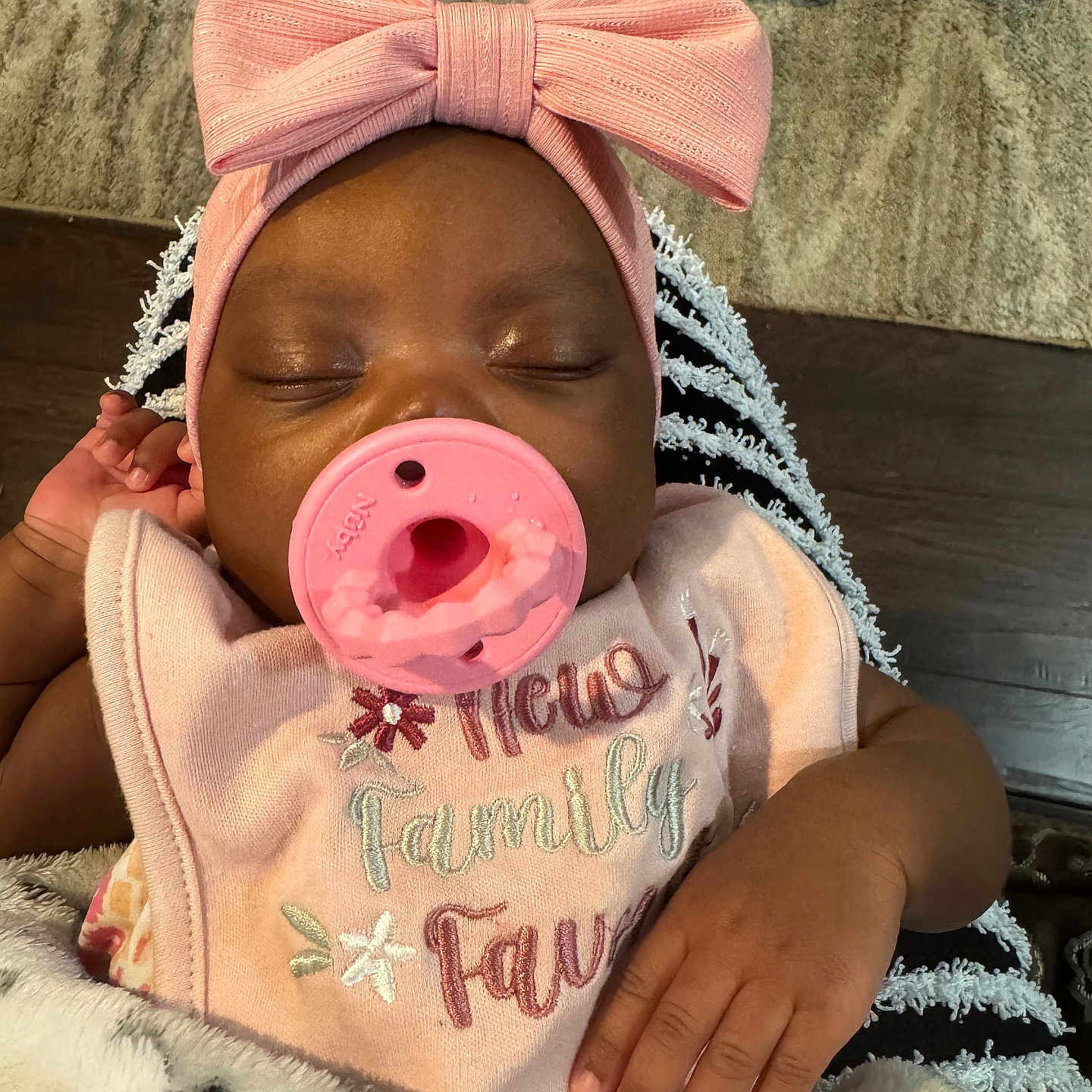 Ivori joined the competition — help win amazing prizes! baby, bib, blanket, carpet, child, clothing, cozy, cute, floor, hand, headband, home, indoors, infant, pacifier, peaceful, pink_bow, portrait, relaxed, sleeping