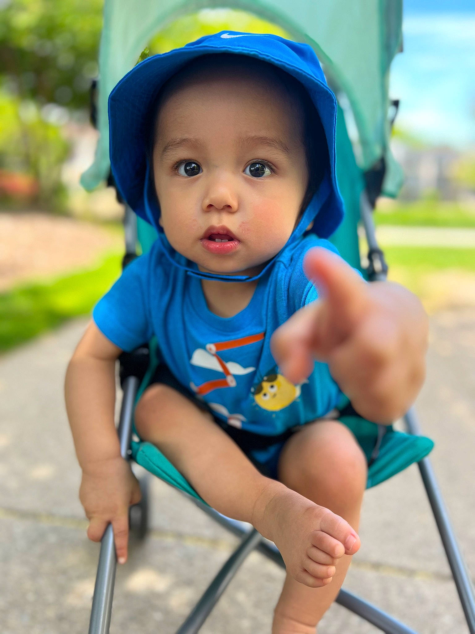 Ricky joined the competition — help win amazing prizes! azure, baby_toddler_clothing, blue, cap, child, clothing, eye, face, facial_expression, fun, grass, happy, leisure, people, person, photograph, product, public_space, shorts, skin