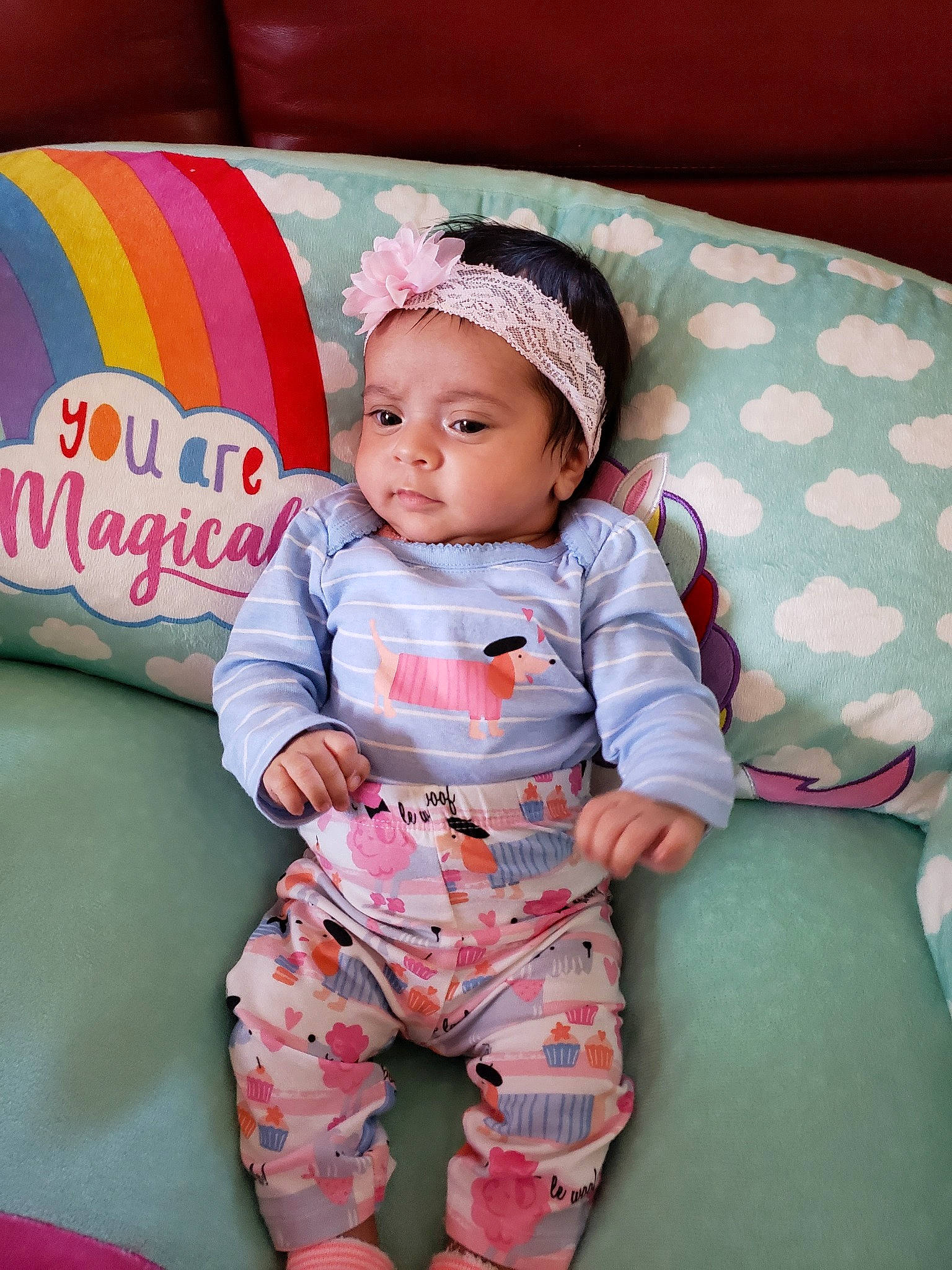 Iris is registered to the contest to win money with this photo: baby, baby_products, baby_toddler_clothing, child, head, nap_mat, pajamas, pattern, person, pink, product, room, skin, smile, textile, toddler