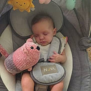Aurora is registered to the contest to win money with this photo: baby, sleeping, plush_toy, baby_rocker, gray, pink, soft_toy, hanging_toys, sun_toy, cloud_toy, raindrop_toy, infant, child, cute, cozy, resting, comfort, indoors, peaceful, clothing