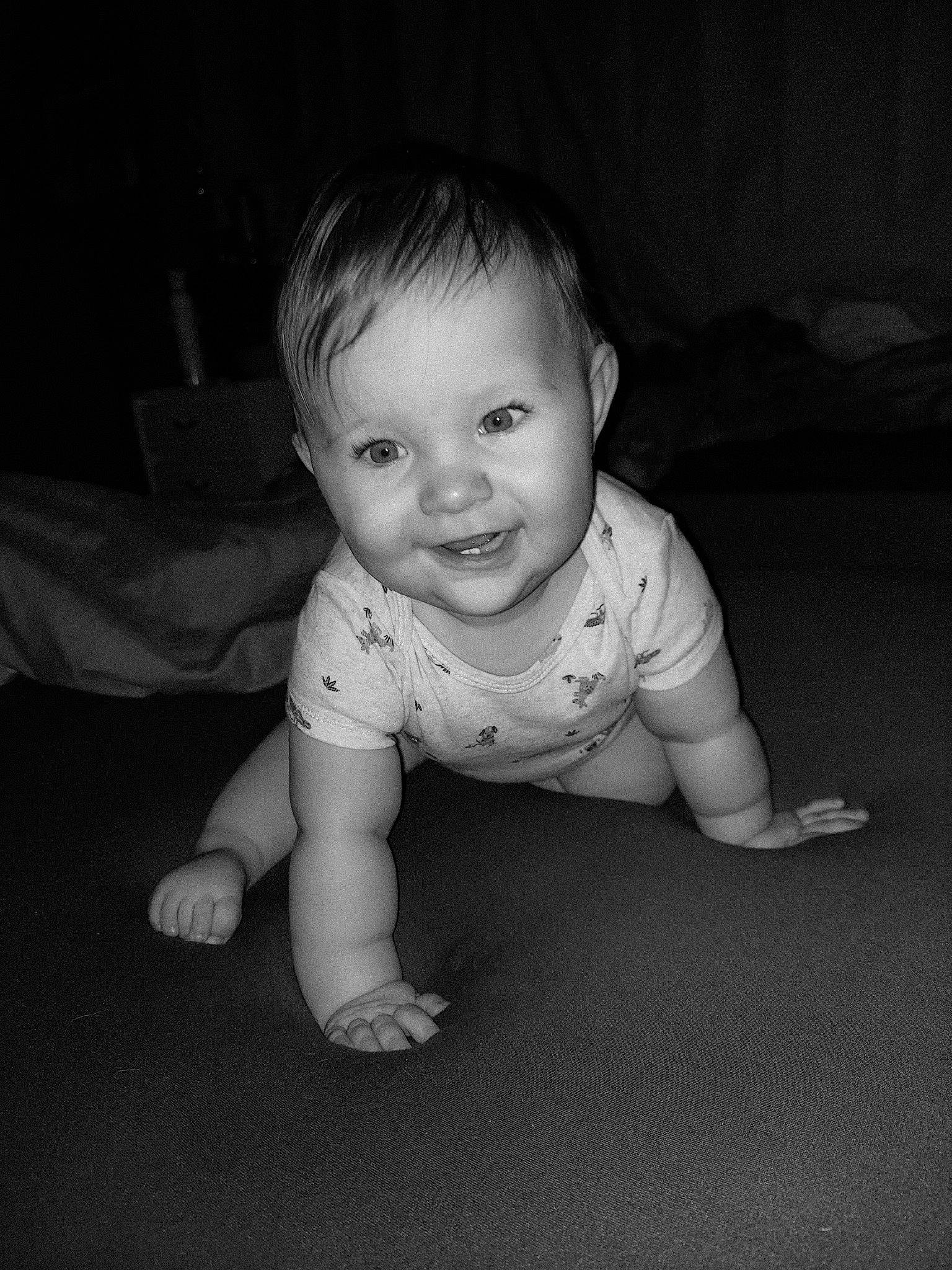 Lincoln joined the competition — help win amazing prizes! baby, baby_toddler_clothing, cheek, child, comfort, crawling, darkness, flash_photography, floor, flooring, grass, happy, iris, joy, monochrome, monochrome_photography, nose, person, sitting, smile