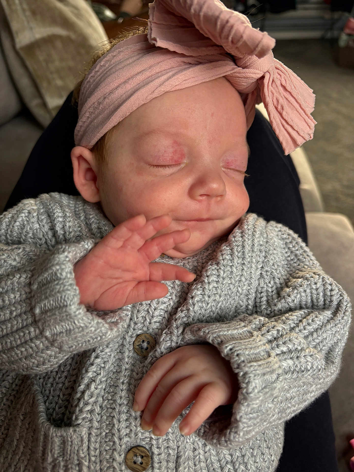 Aryah joined the competition — help win amazing prizes! baby, sleeping, hand, headband, pink, bow, sweater, knitwear, cozy, cute, child, infant, peaceful, face, closed_eyes, couch, indoors, portrait, soft, relaxation