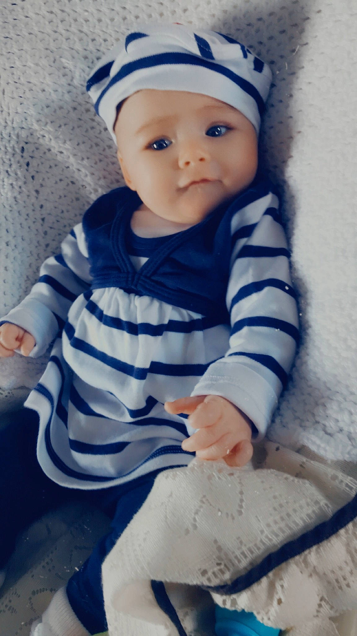 Léna a rejoint le concours — aidez-le/la à gagner de superbes lots ! azure, baby, baby_toddler_clothing, beanie, beauty, blue, cap, cheek, child, electric_blue, eye, eyebrow, head, headwear, iris, lip, pattern, person, skin, sleeve