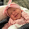 Scotlyn is registered to the contest to win money with this photo: baby, smiling, sleeping, pink_headband, blanket, cozy, infant, cute, child, portrait, clothing, soft, resting, face, newborn, warm, indoors, headwear, happiness, comfort