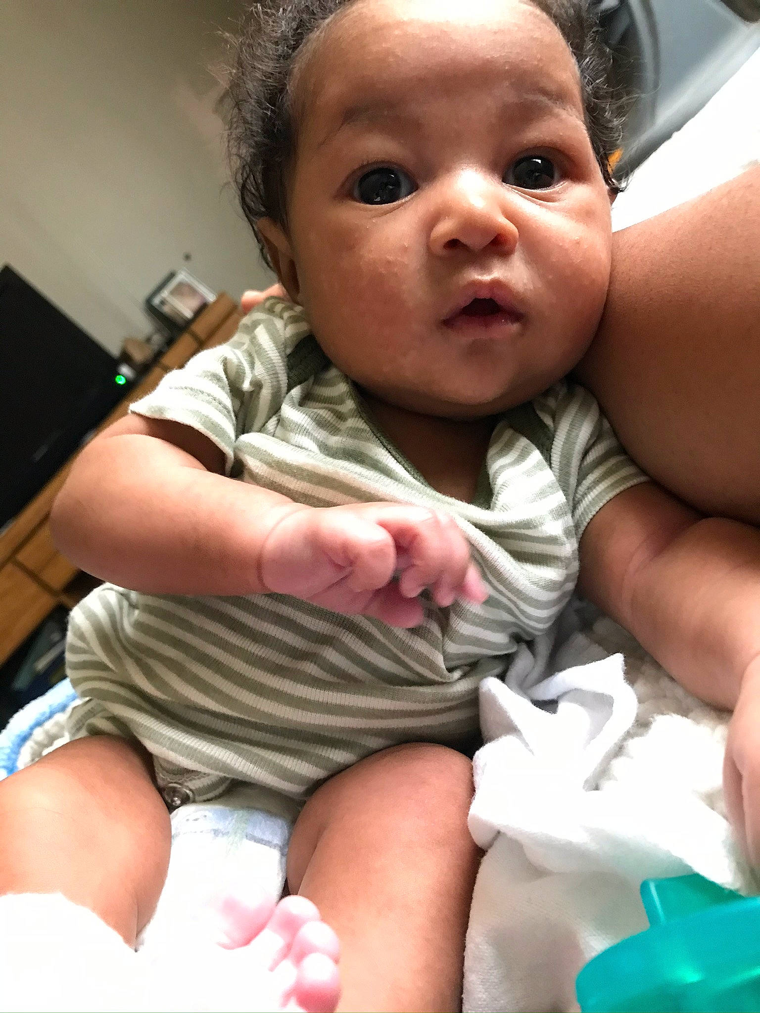 Zahara joined the competition — help win amazing prizes! baby, baby_toddler_clothing, blue, cheek, comfort, eye, eyebrow, finger, gesture, green, happy, iris, joint, mouth, muscle, nose, person, skin, sleeve, surprise