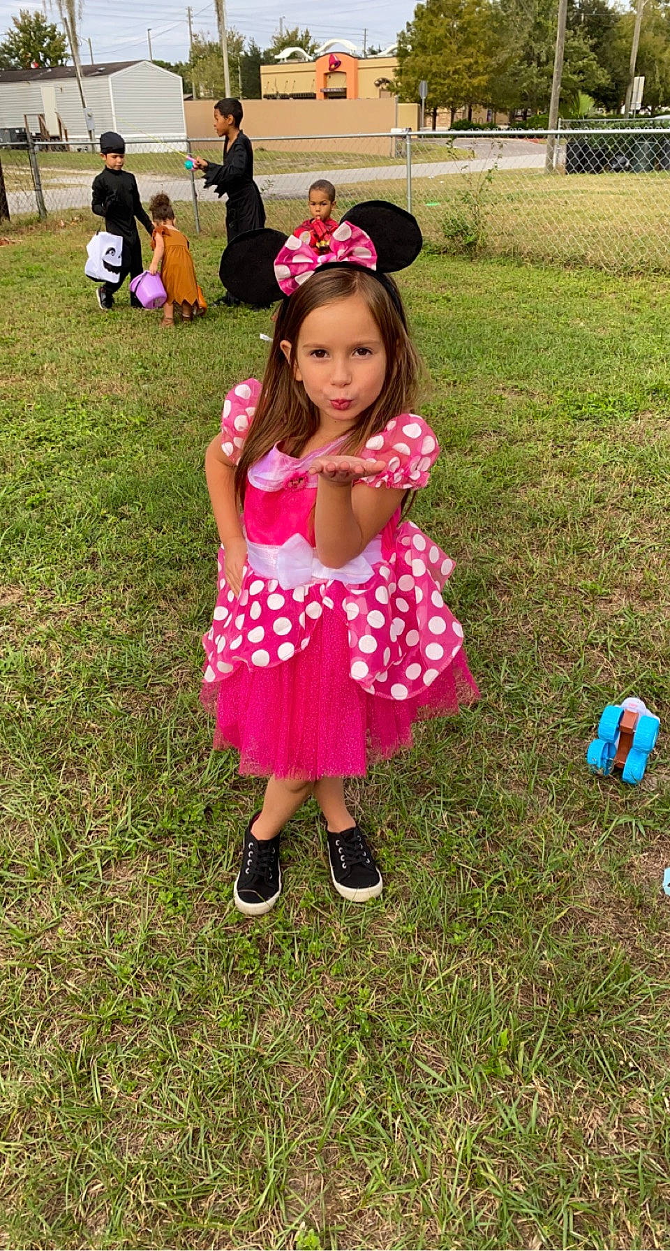 Abigale joined the competition — help win amazing prizes! ball, child, event, football, footwear, fun, grass, grassland, happy, hat, headwear, leisure, magenta, people_in_nature, person, pink, plant, recreation, shoe, sneakers