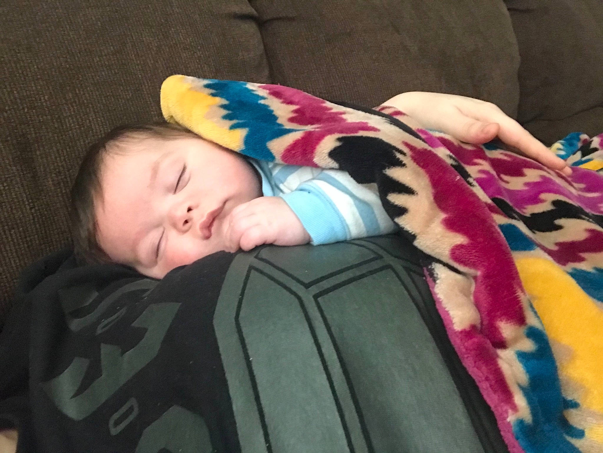 Leighton is registered to the contest to win money with this photo: baby, baby_products, baby_toddler_clothing, cheek, child, comfort, eye, head, iris, linens, nap, pattern, person, pink, product, room, sitting, skin, sleeve, textile