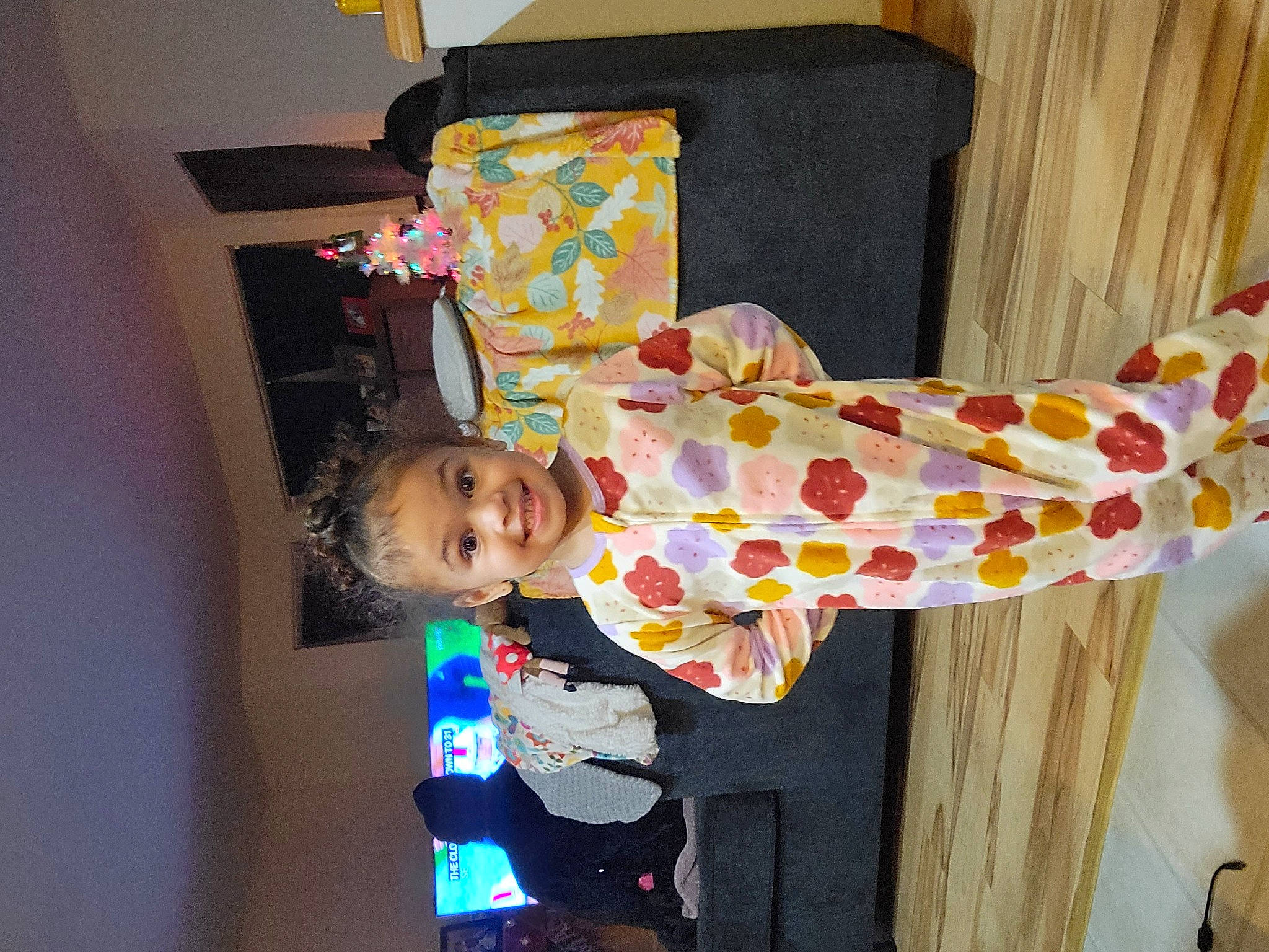 Isabelle is registered to the contest to win money with this photo: baby, baby_products, baby_toddler_clothing, child, event, happy, home_accessories, joy, linens, magenta, pattern, person, room, smile, toddler