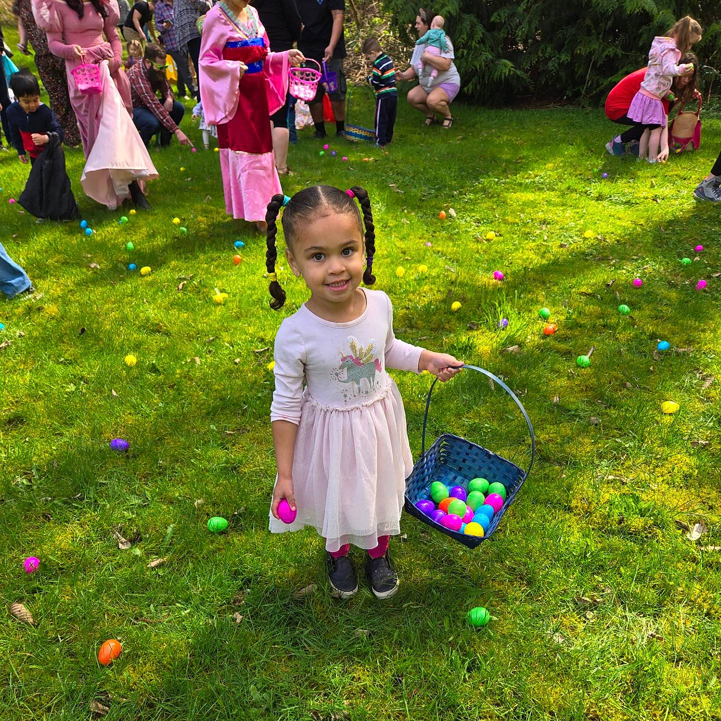 Isabelle is registered to the contest to win money with this photo: botany, child, footwear, fun, grass, green, groundcover, happy, joy, leaf, leisure, people_in_nature, person, petal, photograph, pink, plant, public_space, recreation, smile