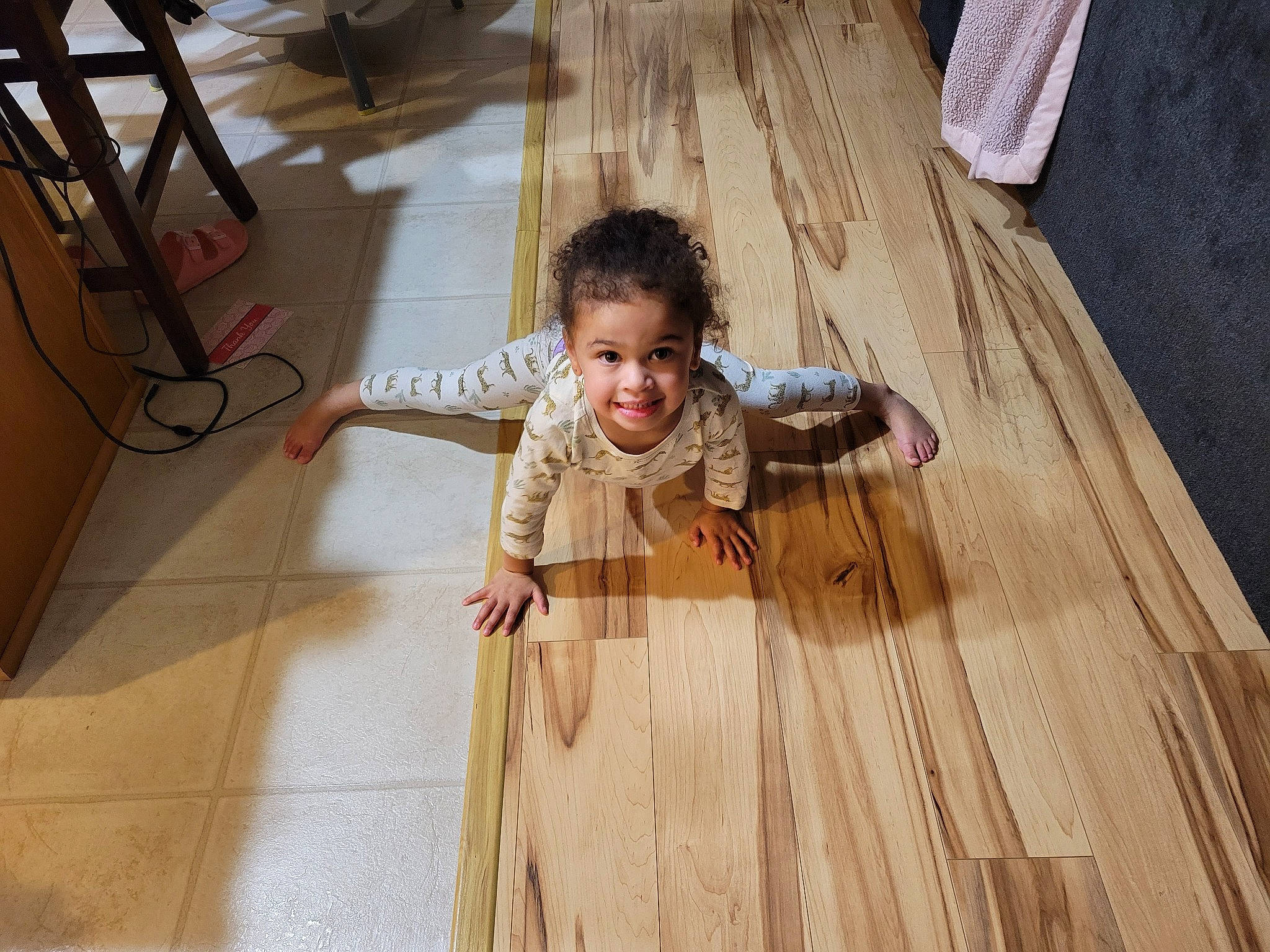 Isabelle joined the competition — help win amazing prizes! baby_toddler_clothing, chair, comfort, floor, flooring, fun, happy, hardwood, joy, laminate_flooring, leisure, pattern, person, plank, plywood, sitting, smile, toddler, varnish, wood